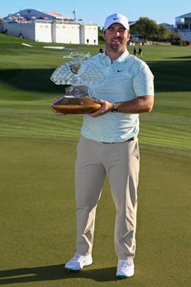 SCOTTSDALE, AZ - FEBRUARY 08: Chris Gotterup (USA) holds the trophy for winning the Waste Management Phoenix Open on February 8, 2026, at TPC Scottsdale, Scottsdale, Arizona. (Photo by Ken Murray Icon Sportswire) GOLF: FEB 08 PGA, Golf Herren WM Phoenix Open EDITORIAL USE ONLY Icon2602080224
