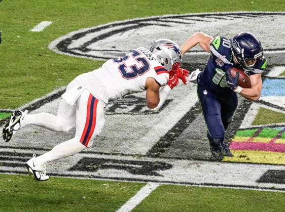 New England Patriots linebacker Christian Elliss (53) moves to tackle Seattle Seahawks wide receiver Cooper Kupp (10) in the third quarter of Super Bowl LX at at Levi s Stadium in Santa Clara, California on Sunday, February 8, 2026.  SBP20260208855 JONxSOOHOO