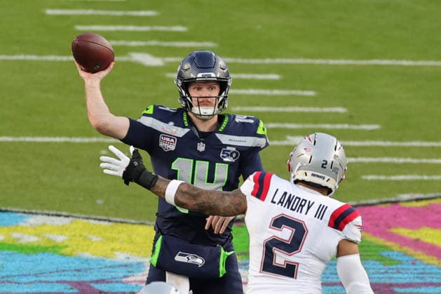 SANTA CLARA, CA - FEBRUARY 08: Seattle Seahawks quarterback Sam Darnold (14) looking to pass under pressure during the Seattle Seahawks versus the New England Patriots Super Bowl LX game on February 8, 2026, at Levi s Stadium in Santa Clara, CA. (Photo by Jevone Moore Icon Sportswire) NFL, American Football Herren, USA FEB 08 Super Bowl LX Seahawks vs Patriots EDITORIAL USE ONLY Icon2602083150