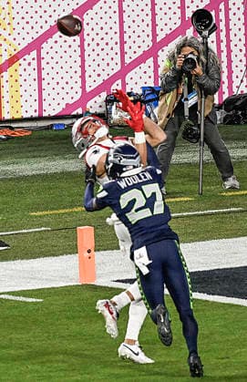 New England Patriots wide receiver Mack Hollins (13) catches a pass for a touchdown in front of Seattle Seahawks cornerback Riq Woolen (27) in the fourth quarter of Super Bowl LX at at Levi s Stadium in Santa Clara, California on Sunday, February 8, 2026.  SBP20260208863 JONxSOOHOO