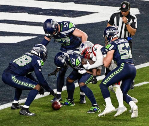 Seattle Seahawks players down a New England Patriots punt on the one yard line in the fourth quarter of Super Bowl LX at at Levi s Stadium in Santa Clara, California on Sunday, February 8, 2026.  SBP20260208866 JONxSOOHOO