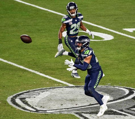 Seattle Seahawks cornerback Josh Jobe (29) watches as Seattle Seahawks safety Julian Love (20) intercepts a pass thrown by New England Patriots quarterback Drake Maye (10) in the fourth quarter of Super Bowl LX at at Levi s Stadium in Santa Clara, California on Sunday, February 8, 2026.  SBP20260208867 JONxSOOHOO