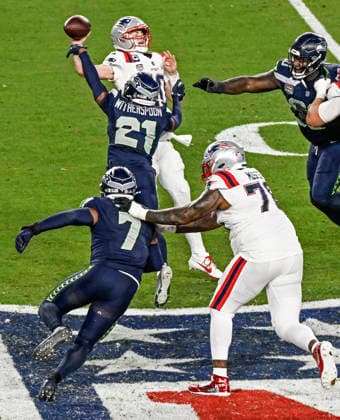 Seattle Seahawks cornerback Devon Witherspoon (21) forces New England Patriots quarterback Drake Maye (10) to fumble in the fourth quarter of Super Bowl LX at at Levi s Stadium in Santa Clara, California on Sunday, February 8, 2026.  SBP20260208870 JONxSOOHOO