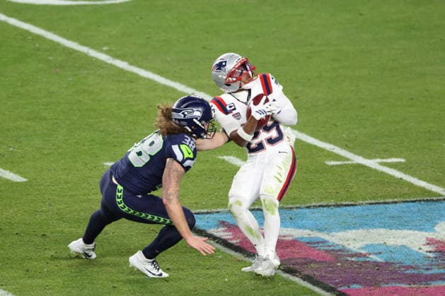 SANTA CLARA, CA - FEBRUARY 08: WR Jeremiah Webb (29) of the New England Patriots is tackled by FB Brady Russell (38) of the Seattle Seahawks during the Seattle Seahawks versus the New England Patriots Super Bowl LX game on February 8, 2026, at Levi s Stadium in Santa Clara, CA. (Photo by Matthew Huang Icon Sportswire) NFL, American Football Herren, USA FEB 08 Super Bowl LX Seahawks vs Patriots EDITORIAL USE ONLY Icon26010124310