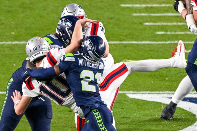 Seattle Seahawks Devon Witherspoon (21) sacks New England Patriots quarterback Drake Maye (10) who fumbles the ball in the fourth quarter of Super Bowl LX at Levi s Stadium in Santa Clara, California on Sunday, February 8, 2026.  SBP20260208485 DAVIDxTULIS
