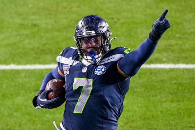 Seattle Seahawks linebacker Uchenna Nwosu (7) runs for a touchdown after recovering a fumble in the fourth quarter of Super Bowl LX at Levi s Stadium in Santa Clara, California on Sunday, February 8, 2026.  SBP20260208488 DAVIDxTULIS