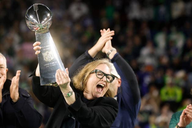 Seattle Seahawks franchise chair Jody Allen, holds the Vince Lombardi Trophy aloft after the Seattle Seahawks defeated the New England Patriots to win Super Bowl LX at Levi s Stadium in Santa Clara, California on Sunday, February 8, 2026.  SBP20260208224 JOHNxANGELILLO