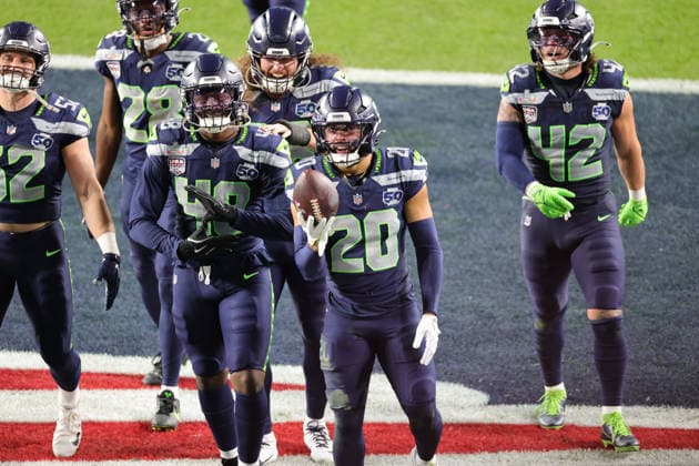 SANTA CLARA, CA - FEBRUARY 08: Seattle Seahawks safety Julian Love (20) shows off his interception football with his teammates during the Seattle Seahawks versus the New England Patriots Super Bowl LX game on February 8, 2026, at Levi s Stadium in Santa Clara, CA. (Photo by Jevone Moore Icon Sportswire) NFL, American Football Herren, USA FEB 08 Super Bowl LX Seahawks vs Patriots EDITORIAL USE ONLY Icon2602083178