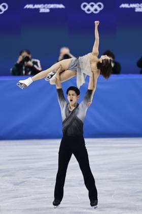Milan Cortina Olympics: Figure skating, Eiskunstlauf Riku Miura (top) and Ryuichi Kihara of Japan pose at the conclusion of the pairs free program during the figure skating team event at the Milan Cortina Olympics at Milano Ice Skating Arena in Milan on Feb. 8, 2026.  A14AA0005258472P