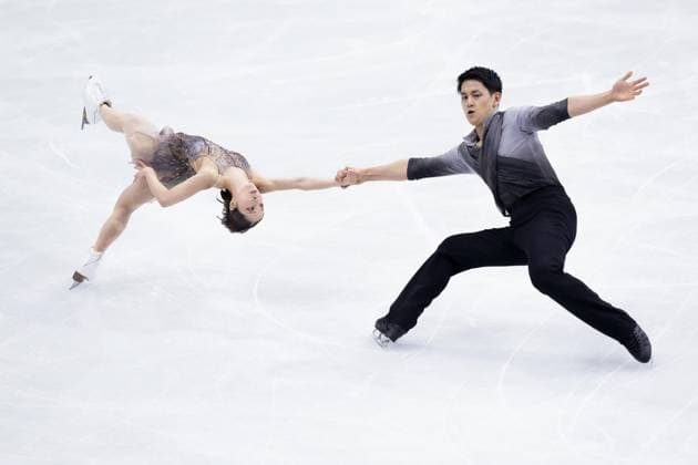 Milan Cortina Olympics: Figure skating, Eiskunstlauf Riku Miura (L) and Ryuichi Kihara of Japan perform in the pairs free program during the figure skating team event at the Milan Cortina Olympics at Milano Ice Skating Arena in Milan on Feb. 8, 2026.  A14AA0005258543P