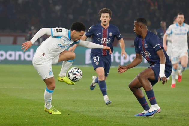 French League One - PSG vs OM PSG’s Joao Neves and Willian Pacho battles OM’s Ethan Nwaneri during the 2025-26 French soccer League One game, PSG vs OM in Parc des Princes Stadium, Paris, France on February 8th 2026. Photo by Henri Szwarc ABACAPRESS.COM Paris France  Copyright: xSzwarcxHenri ABACAx