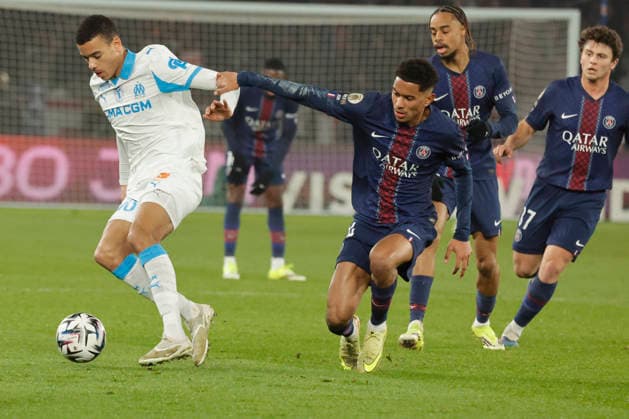 French League One - PSG vs OM PSG’s Bradley Barcola and Senny Mayulu battles OM’s Mason Greenwood during the 2025-26 French soccer League One game, PSG vs OM in Parc des Princes Stadium, Paris, France on February 8th 2026. Photo by Henri Szwarc ABACAPRESS.COM Paris France  Copyright: xSzwarcxHenri ABACAx