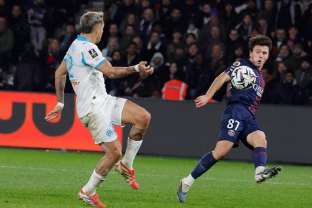 French League One - PSG vs OM PSG’s Joao Neves battles OM’s Facundo Medina and the last scores the own goal for 3-0 during the 2025-26 French soccer League One game, PSG vs OM in Parc des Princes Stadium, Paris, France on February 8th 2026. Photo by Henri Szwarc ABACAPRESS.COM Paris France  Copyright: xSzwarcxHenri ABACAx
