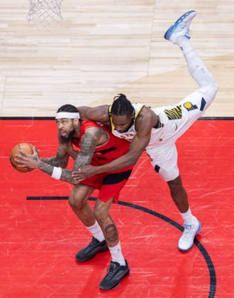 (260209) -- TORONTO, Feb. 9, 2026 -- Brandon Ingram (L) of Toronto Raptors vies with Aaron Nesmith of Indiana Pacers during the 2025-2026 NBA, Basketball Herren, USA regular season game between Toronto Raptors and Indiana Pacers in Toronto, Canada, on Feb. 8, 2026. (Photo by Xinhua) (SP) CANADA-TORONTO-BASKETBALL-NBA-PACERS VS RAPTORS ZouxZheng 
