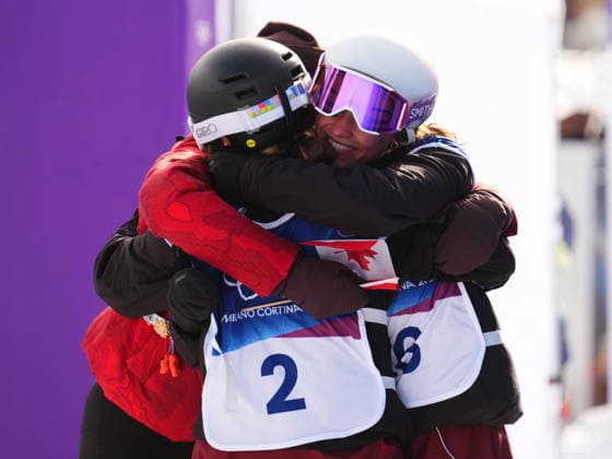 February 9, 2026, Livigno, Italy: Megan Oldham, of Canada, centre, reacts with teammate Naomi Urness, right, and a staff member after Oldham s third run as they compete in the women s freeski slopestyle final at the Milano Cortina 2026 Winter Olympic Games, Olympische Spiele, Olympia, OS in Livigno, Italy on Monday, Feb. 9, 2026. Canada News - February 9, 2026  - ZUMAc35_ 20260209_zaf_c35_033 Copyright: xSeanxKilpatrickx