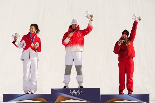 February 9, 2026, Livigno, Italy: Gold medalist Switzerland s Mathilde Gremaud, centre, celebrates alongside silver medalist China s Eileen Gu, left, and bronze medalist Canada s Megan Oldham after the women s freestyle skiing slopestyle finals at the 2026 Winter Olympics, in Livigno, Italy, Monday, Feb. 9, 2026. Canada News - February 9, 2026  - ZUMAc35_ 20260209_zaf_c35_039 Copyright: xSeanxKilpatrickx