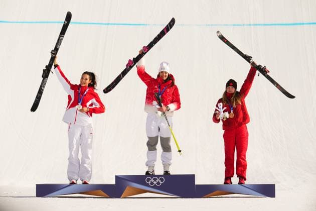 February 9, 2026, Livigno, Italy: Gold medalist Switzerland s Mathilde Gremaud, centre, celebrates alongside silver medalist China s Eileen Gu, left, and bronze medalist Canada s Megan Oldham after the women s freestyle skiing slopestyle finals at the 2026 Winter Olympics, in Livigno, Italy, Monday, Feb. 9, 2026. Canada News - February 9, 2026  - ZUMAc35_ 20260209_zaf_c35_050 Copyright: xSeanxKilpatrickx