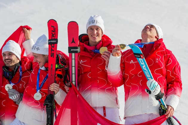 Winter Olympics in Milan Cortina 2026 Bormio, Italy 20260209. Gold medalist Franjo von Allmen and Tanguy Nef from Switzerland together with silver medalists Marco Odermatt and Loic Meillard from Switzerland on the podium after the men s alpine downhill slalom team competition during the Milan Cortina 2026 Winter Olympics. Photo: Cornelius Poppe NTB Bormio Italy EDITORIAL USE ONLY. RESTRICTED USE FOR BETTING COMPANIES Ref:_SPO7GaDUfr91SI.jpg *** Winter Olympics in Milan Cortina 2026 Bormio, Italy 20260209 Gold medalist Franjo von Allmen and Tanguy Nef from Switzerland together with silver medalists Marco Odermatt and Loic Meillard from Switzerland on the podium after the men s alpine downhill slalom team competition during the Milan Cortina 2026 Winter Olympics Photo Cornelius Poppe NTB Bormio Italy EDITORIAL USE ONLY RESTRICTED USE FOR BETTING COMPANIES  Copyright: xCorneliusxPoppex xNTBx