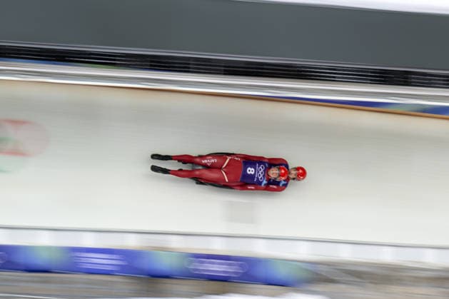 Sevics Mikelsevics Eduards and Krasts Lukass from Latvia during the Winter Olympic Games, Olympische Spiele, Olympia, OS Milano Cortina 2026, in Cortina Sliding Centre , on February 9 2026, in Cortina, Italy  Copyright: xFedericoxManoni IPAxSportx xipa-agency.netx xx IPA_71185414 IPA_Agency_IPA71185414