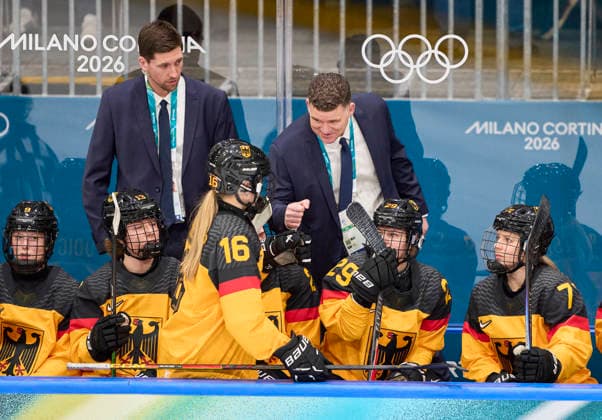 Headcoach Jeff MacLeod of Germany with Jule Schiefer of Germany at the preliminary women Ice hockey, Eishockey match Group B Germany - France of the Milano Cortina 2026 Winter Olympic Games, Olympische Spiele, Olympia, OS at Milano Rho Ice Hockey Arena on February 9, 2026 in Milan, Italy.