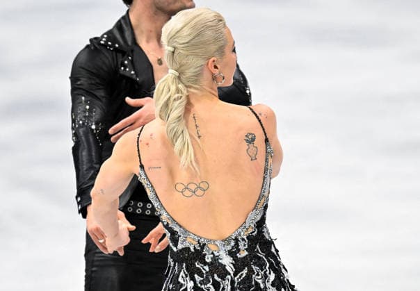 Winter Olympics - Olivia Smart and Tim Dieck At Figure skating, Eiskunstlauf Team Event Practice - Milan Olivia Smart and Tim Dieck of Spain during their practice of the Figure Skating Team Event at the Milano Cortina 2026 Winter Olympic Games, Olympische Spiele, Olympia, OS at Milano Ice Skating Arena on February 8, 2026 in Milan, Italy. Olivia Smart has tattoos of the olympic rings on her back. Photo by JMP ABACAPRESS.COM Milan Italy  Copyright: xJMP ABACAx
