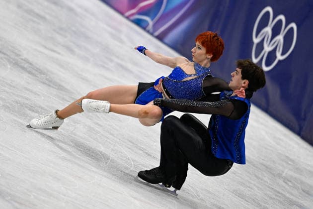 Evgeniia Lopareva And Geoffrey Brissaud At Figure skating, Eiskunstlauf Team Event Practice - Milan Evgeniia Lopareva and Geoffrey Brissaud of France during their practice of the Figure Skating Team Event at the Milano Cortina 2026 Winter Olympic Games, Olympische Spiele, Olympia, OS at Milano Ice Skating Arena on February 8, 2026 in Milan, Italy. Olivia Smart has tattoos of the olympic rings on her back. Photo by JMP ABACAPRESS.COM Milan Italy  Copyright: xJMP ABACAx