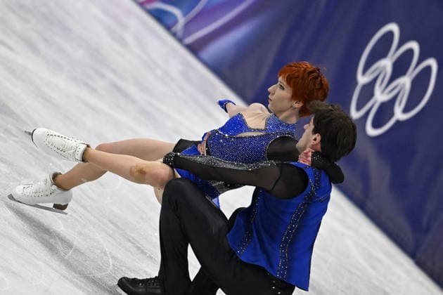 Evgeniia Lopareva And Geoffrey Brissaud At Figure skating, Eiskunstlauf Team Event Practice - Milan Evgeniia Lopareva and Geoffrey Brissaud of France during their practice of the Figure Skating Team Event at the Milano Cortina 2026 Winter Olympic Games, Olympische Spiele, Olympia, OS at Milano Ice Skating Arena on February 8, 2026 in Milan, Italy. Olivia Smart has tattoos of the olympic rings on her back. Photo by JMP ABACAPRESS.COM Milan Italy  Copyright: xJMP ABACAx