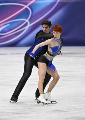 Evgeniia Lopareva And Geoffrey Brissaud At Figure skating, Eiskunstlauf Team Event Practice - Milan Evgeniia Lopareva and Geoffrey Brissaud of France during their practice of the Figure Skating Team Event at the Milano Cortina 2026 Winter Olympic Games, Olympische Spiele, Olympia, OS at Milano Ice Skating Arena on February 8, 2026 in Milan, Italy. Olivia Smart has tattoos of the olympic rings on her back. Photo by JMP ABACAPRESS.COM Milan Italy  Copyright: xJMP ABACAx