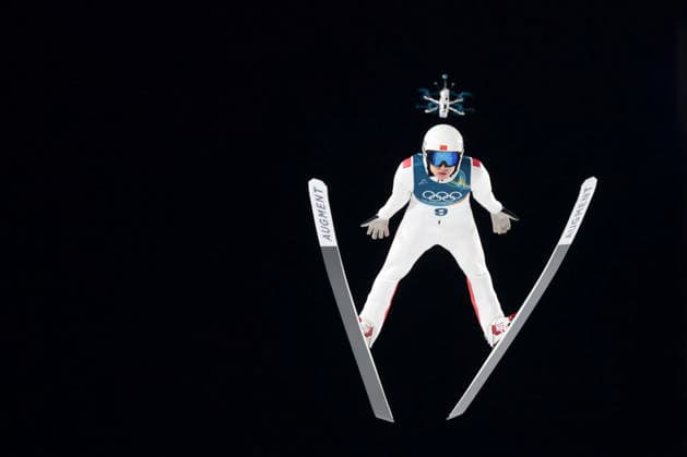 OLYMPICS - Winter Olympic Games, Olympische Spiele, Olympia, OS Milano Cortina 2026 VAL DI FIEMME,ITALY,09.FEB.26 - OLYMPICS, Ski jumping, Skispringen, Ski, nordisch - Winter Olympic Games Milano Cortina 2026, normal hill, men, individual. Image shows Qiwu Song (CHN).  GEPAxpictures xMatthiasxTrinkl
