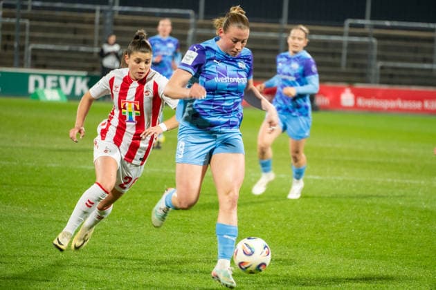 Deutschland: Google Pixel Frauen-Bundesliga 2025 26 1.FC Köln vs SGS Essen, 17. Spieltag - 09.02.2026 - Franz-Kremer-Stadion (NRW) Ramona Maier (SGS Essn, 9) Martyna Wiankowska (1.FC Köln, 26) Copyright: xOrhanxHabashx