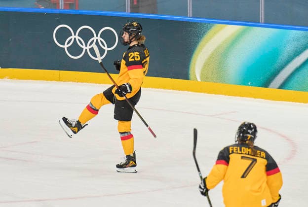 Laura Kluge of Germany celebrates her 1-0 goal, happy, laugh, celebration, at the preliminary women Ice hockey, Eishockey match Group B Germany - France of the Milano Cortina 2026 Winter Olympic Games, Olympische Spiele, Olympia, OS at Milano Rho Ice Hockey Arena on February 9, 2026 in Milan, Italy.