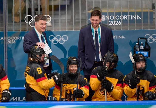 Headcoach Jeff MacLeod of Germany Svenja Voigt of Germany Anne Bartsch of Germany at the preliminary women Ice hockey, Eishockey match Group B Germany - France of the Milano Cortina 2026 Winter Olympic Games, Olympische Spiele, Olympia, OS at Milano Rho Ice Hockey Arena on February 9, 2026 in Milan, Italy.
