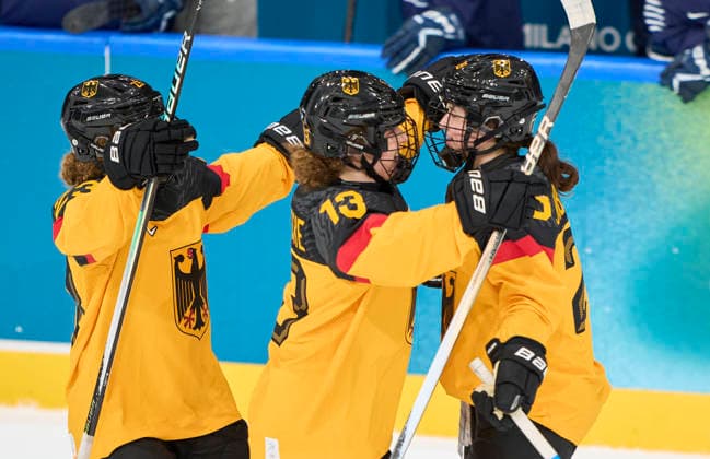 Katarina Jobst-Smith of Germany celebrates her 2-1 sudden death goal with Luisa Welke of Germany Lilli Welcke of Germany after the preliminary women Ice hockey, Eishockey match Group B Germany - France of the Milano Cortina 2026 Winter Olympic Games, Olympische Spiele, Olympia, OS at Milano Rho Ice Hockey Arena on February 9, 2026 in Milan, Italy.