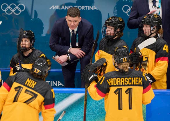 Headcoach Jeff MacLeod of Germany Nicola Hadraschek- Eisenschmid of Germany Emily Nix of Germany Svenja Voigt of Germany Mathilda Heine of Germany Anne Bartsch of Germany at the preliminary women Ice hockey, Eishockey match Group B Germany - France of the Milano Cortina 2026 Winter Olympic Games, Olympische Spiele, Olympia, OS at Milano Rho Ice Hockey Arena on February 9, 2026 in Milan, Italy.