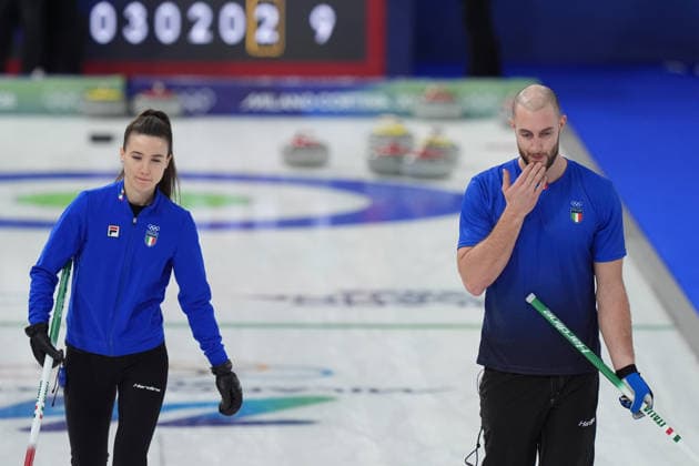 Italy s Stefania Constantini and Amos Mosaner during curling mixed doubles semi final Italy and United States at the Cortina Curling Olympic Stadium at the Milano Cortina 2026 Winter Olympics, in Cortina (Italy) February 9, 2026 (Spada LaPresse)  Copyright: xSpada LaPressex