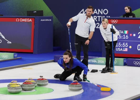 Team USA s Korey Dropkin and teammate Corey Thiesse watch the action in the Curling Mixed Doubles Semi-Finals against Italy at the 2026 Winter Olympics in Cortina, Italy on Monday February 09, 2026. Team USA beat Italy 9-8.  OLY2026020697 HUGOxPHILPOTT