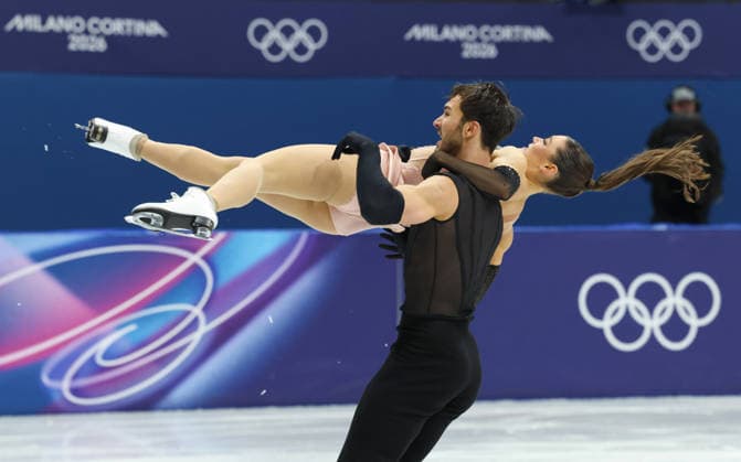 February 9, 2026, Milan, Lombardy, Italy: LAURENCE FOURNIER BEAUDRY and GUILLAUME CIZERON of France perform their Ice Dance Rhythm Dance of the Figure skating, Eiskunstlauf Team Event at the Milano Cortina 2026 Winter Olympic Games, Olympische Spiele, Olympia, OS Olympics 2026: Milano Cortina: Figure Skating Ice Dance Rhythm Dance  - ZUMAc179 20260209_oly_c179_099 Copyright: xMickaelxChavetx