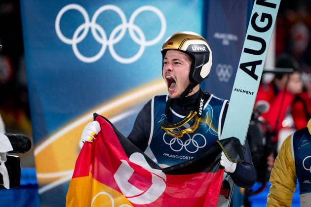 RAIMUND Philipp (Deutschland) jubelt im Ziel ueber den Sprung zu Sieg und Gold Medaille, ITA, Olympische Spiele Milano Cortina 2026, Olympia, Skispringen, Normalschanze Einzel Herren, 09.02.2026 ITA, Olympische Spiele Milano Cortina 2026, Olympia, Skispringen, Normalschanze Einzel Herren, 09.02.2026 Predazzo *** RAIMUND Philipp Germany cheers at the finish line after jumping to victory and gold medal, ITA, Olympic Games Milano Cortina 2026, Olympic Games, Ski Jumping, Normal Hill Individual Men, 09 02 2026 ITA, Olympic Games Milano Cortina 2026, Olympic Games, Ski Jumping, Normal Hill Individual Men, 09 02 2026 Predazzo Copyright: xEibner-Pressefoto Memmlerx EP_MMR