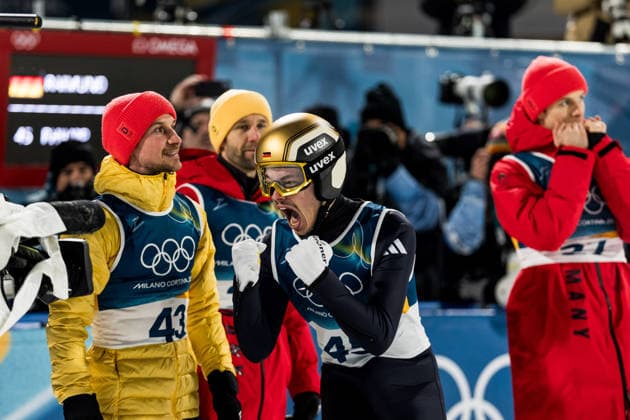 PREDAZZO, ITALY - FEBRUARY 9: Philipp Raimund ( Germany ) cheers after winning Gold during the Ski jumping, Skispringen, Ski, nordisch Men s Normal Hill Individual at the Milano Cortina 2026 Olympics at Predazzo Ski Jumping Stadium on day 3 of the Milano Cortina 2026 Olympics on February 9, 2026 in Predazzo, Italy. Editorial use only. Trentino-Suedtirol Italy Copyright: xSteffiexWunderlx