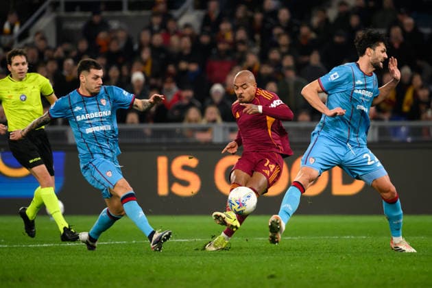 Gianluca Gaetano of Cagliari Calcio, Donyell Malen of AS Roma and Alberto Dossena of Cagliari Calcio during the Serie A 2025 2026 football match between AS Roma and Cagliari Calcio at Stadio Olimpico in Rome (Italy), February 9, 2026. AndreaxStaccioli