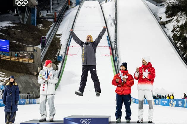 PREDAZZO, ITALY - FEBRUARY 9: Philipp Raimund ( Germany ) jumping on the podium after winning Gold during the medal ceremony of the Ski jumping, Skispringen, Ski, nordisch Men s Normal Hill Individual at the Milano Cortina 2026 Olympics at Predazzo Ski Jumping Stadium on day 3 of the Milano Cortina 2026 Olympics on February 9, 2026 in Predazzo, Italy. Editorial use only. Trentino-Suedtirol Italy Copyright: xSteffiexWunderlx