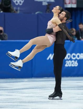 February 9, 2026, Milan, ITALY: Laurence Fournier Beaudry and Guillaume Cizeron of Team France compete in the Figure skating, Eiskunstlauf Ice Dance Rhythm Dance event during the 2026 Milan Cortina Winter Olympics in Milan, Italy on Monday, February 9, 2026. Canada News - February 9, 2026  - ZUMAc35_ 20260209_zaf_c35_142 Copyright: xNathanxDenettex