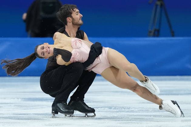 February 9, 2026, Milan, ITALY: Laurence Fournier Beaudry and Guillaume Cizeron of Team France compete in the Figure skating, Eiskunstlauf Ice Dance Rhythm Dance event during the 2026 Milan Cortina Winter Olympics in Milan, Italy on Monday, February 9, 2026. Canada News - February 9, 2026  - ZUMAc35_ 20260209_zaf_c35_143 Copyright: xNathanxDenettex