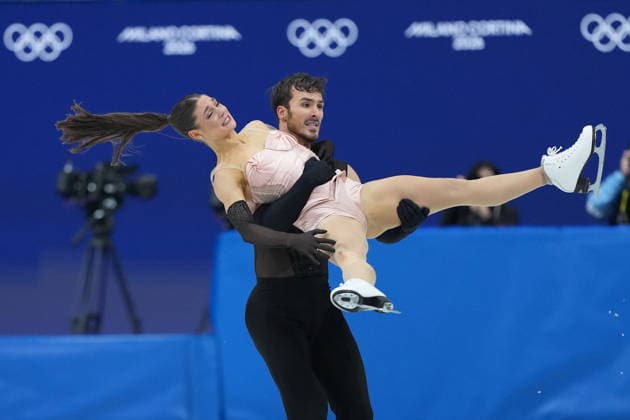 February 9, 2026, Milan, ITALY: Laurence Fournier Beaudry and Guillaume Cizeron of Team France compete in the Figure skating, Eiskunstlauf Ice Dance Rhythm Dance event during the 2026 Milan Cortina Winter Olympics in Milan, Italy on Monday, February 9, 2026. Canada News - February 9, 2026  - ZUMAc35_ 20260209_zaf_c35_144 Copyright: xNathanxDenettex