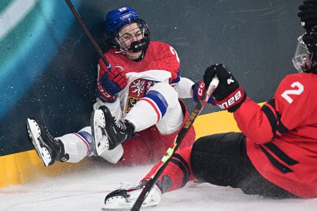 L-R Barbora Jurickova (CZE) and Sophie Jaques (CAN) in action during the women s Ice hockey, Eishockey match of Preliminary Round, Group A: Canada vs Czechia, at the Milano Cortina 2026 Winter Olympic Games, Olympische Spiele, Olympia, OS in Milan, Italy, on February 9, 2026. (CTKxPhoto MichalxKamaryt) CTKPhotoP2026020910568  CTKPhotoP2026020910568
