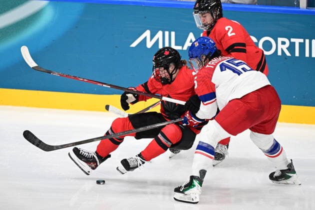 L-R Sarah Fillier (CAN), Andrea Trnkova (CZE) and Sophie Jaques (CAN) in action during the women s Ice hockey, Eishockey match of Preliminary Round, Group A: Canada vs Czechia, at the Milano Cortina 2026 Winter Olympic Games, Olympische Spiele, Olympia, OS in Milan, Italy, on February 9, 2026. (CTKxPhoto MichalxKamaryt) CTKPhotoP2026020910849  CTKPhotoP2026020910849
