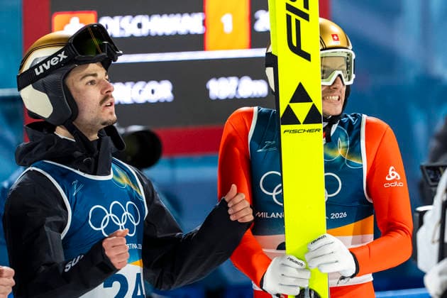 Ski jumping, Skispringen, Ski, nordisch - Milano Cortina 2026 Winter Olympics Day 3 Bronze medallist Switzerland s Gregor Deschwanden (R) celebrates with Switzerland s Sandro Hauswirth in the finish area after jumping during the men s ski jumping normal hill individual final round of the Milano Cortina 2026 Winter Olympic Games, Olympische Spiele, Olympia, OS at Predazzo Ski Jumping Stadium in Predazzo (Val di Fiemme), on February 9, 2026 Predazzo Italy  Copyright: xAndrzejxIwanczukx originalFilename:iwanczuk-skijumpi260210_npUlD.jpg