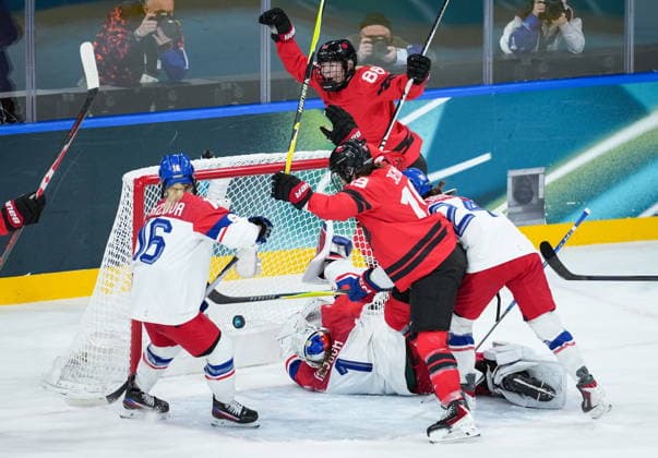 February 9, 2026, Milan, ITALY: Canada s Julia Gosling (88) and Brianne Jenner (19) celebrate Gosling s goal against Czech Republic goalie Michaela Hesova (1) as Katerina Mrazova (16) watches during the first period of a preliminary round women s hockey game at the Milan Cortina Winter Olympics, in Milan, on Monday, February 9, 2026. Canada News - February 9, 2026  - ZUMAc35_ 20260209_zaf_c35_213 Copyright: xDarrylxDyckx