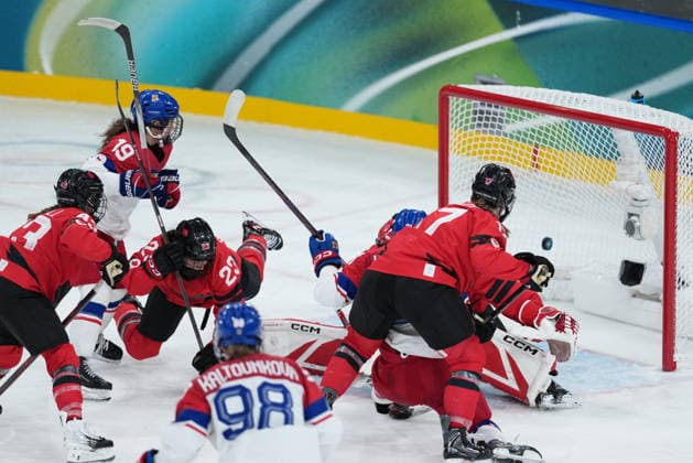 February 9, 2026, Milan, ITALY: CzechiaöÄÃ s Natalie Mlynkova (19) scores on Canada goalie Ann-Renee Desbiens (35) during the third period of a preliminary round women s hockey game at the Milan Cortina Winter Olympics, in Milan, on Monday, February 9, 2026. Canada News - February 9, 2026  - ZUMAc35_ 20260209_zaf_c35_218 Copyright: xDarrylxDyckx