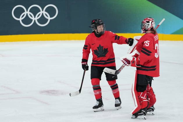 February 9, 2026, Milan, ITALY: CanadaöÄÃ s Jocelyne Larocque (3) and goalie Ann-Renee Desbiens (35) celebrate their 5-1 win over Czechia in a preliminary round women s hockey game at the Milan Cortina Winter Olympics, in Milan, on Monday, February 9, 2026. Canada News - February 9, 2026  - ZUMAc35_ 20260209_zaf_c35_225 Copyright: xDarrylxDyckx